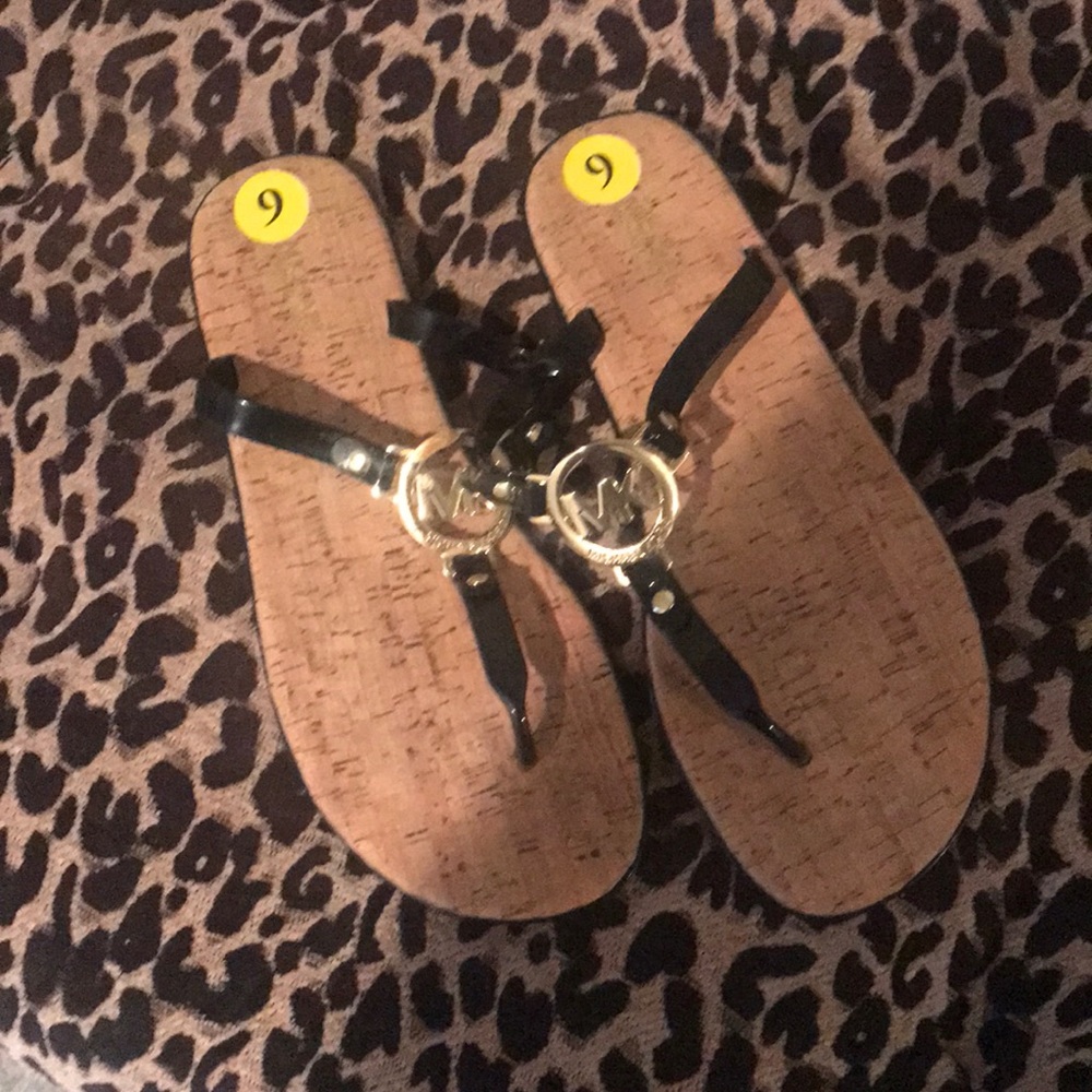 Black MK flip flops
